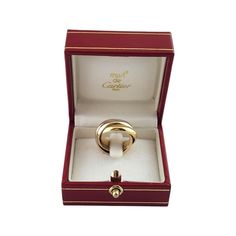 Cartier 18K Tricolor Gold Trinity Ring Size 4.5  This elegant triple band ring by Cartier is crafted in beautifully detailed 18K yellow, white and rose gold. Each band measures 3.9 mm.  Ring Size: 4.5  Weight: 6.79 dwt./10.56 gr.  Hallmark:  750 CARTIER 48 1997  Very good condition, professionally polished.  Will come packaged in a gift box or pouch (when possible) and will be shipped U.S. Priority Mail Insured. Cartier Yellow Gold Rings Perfect For Gifts, Gold Jewelry For Anniversary With Original Box, Gold Jewelry For Anniversary In Original Box, Gold Wedding Jewelry With Original Box, Classic Jewelry With Original Box, Gold Trinity Ring, Triple Band Ring, Art Deco Sapphire Ring, Oval Sapphire Ring