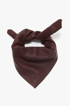 A dark brown, folded leather scarf with a knot at the top and a small embossed VB logo near the bottom, perfect for adding a touch of masculine tailoring to feminine separates. This is the Leather Scarf In Bordeaux by Victoria Beckham. Leather Scarf, Fresh Perspective, S Signature, Designer Outfits Woman, Victoria Beckham, The House, Brown Leather, ? Logo, Clothes For Women