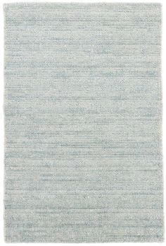 a light blue rug with white stripes on the bottom, and an off - white background