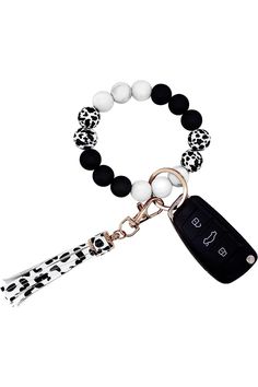 A photo of a silicone beaded key ring bracelet. The bracelet is made of soft, durable silicone and features a variety of colorful beads. A metal key ring and leather tassel are attached to the bracelet.

This alt text is descriptive and accurate, and it would be helpful for people who are visually impaired or using screen readers. It also includes the relevant keywords, such as "silicone beaded key ring bracelet," "wristlet," and "keyholder." Key Ring Bracelet, Keychain Holder, Key Organizer, Bead Bangles, Stretchy Bracelets, Car Keychain, Silicone Beads, Leather Tassel, Bracelet For Women