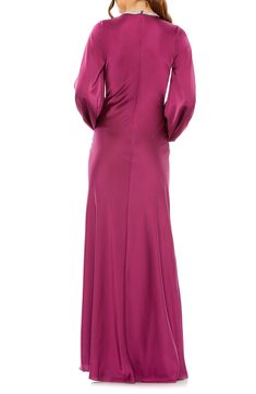 A bedazzled jewel neck stands out against falling folds of satin on a bishop-sleeve column gown that's gloriously gasp-worthy. 63" length Jewel neck Long sleeves Lined 100% polyester Spot clean Imported Asian Owned/Founded Berry Dress, Maje Dress, Long Formal Dress, Sheath Gown, Tory Burch Dress, Mac Duggal Dresses, Designer Prom Dresses, Prom Designs, Column Gown