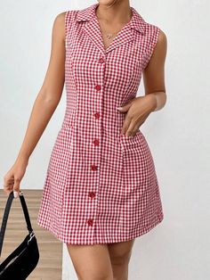 a woman in a red and white checkered dress is holding a black handbag