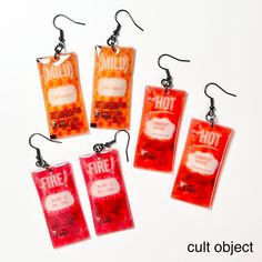 1 pair of large fast food hot sauce packet dangle earrings - mild sauce - hot sauce - fire sauce - taco - junk food super lightweight! earrings are approximately 2 inches long and 1 inch in width made with shrinky dink plastic and resin DISCLAIMER: while these earrings may appear 3 dimensional, they are not. They are made from flat plastic and domed resin and are not actual sauce packets Please see my other listings for unique, handmade items!! *Please note that while I strive for a perfect and consistent product, this item is handmade and by nature may have slight imperfections. Cheap Funky Dangle Earrings, Unique Earrings Weird, Soup Can Earrings, Shrinky Dink, Earrings Food, French Fries Earrings, Silly Earrings, Novelty Resin Dangle Earrings, Crazy Earrings