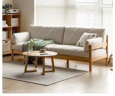 a living room scene with focus on the couch and coffee table