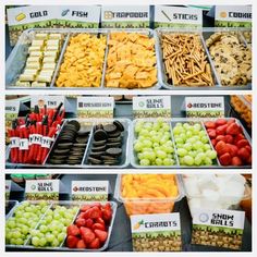 different types of snacks displayed in bins on display at a store or other market