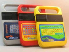 three children's toy radio sets sitting next to each other