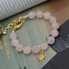 Madagascar Rose Quartz is noted for its superior quality Madagascar Rose Quartz is a rare, classic rose pink gemstone. A romantic gemstone historically known as the Gem of Love! Rose Quartz: self love, love, unconditional love, joy, inner peace, connection, matters of the heart Every stone is natural, so they may vary oh-so-slightly from one another. This bracelet makes a wonderful gift for any Rose Quartz lover in your family or friend circle. Anti Tarnish⭐️ Hypoallergenic MEASUREMENTS *Diamete Friend Circle, Sun Bracelet, Rose Quartz Bracelet Beads, Girly Bracelets, Healing Gemstones, Pretty Jewelry Necklaces, Rose Quartz Jewelry, Bracelets Design, Bracelet Love