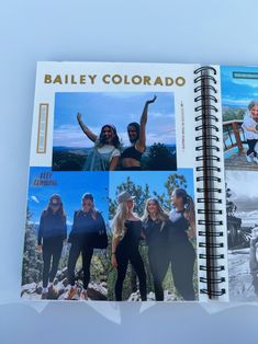 a spiral notebook with photos of people from different countries and the words bailey colorado on it