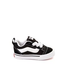 90s Style Low-top Sneakers For Skateboarding, 90s Low-top Skateboarding Sneakers, Retro High-top Vans Sneakers, Black Urban Cotton Skate Shoes, Vans Low-top Sneakers With Elastic Laces, Black Retro Vans Sneakers, Canvas Shoes With Elastic Laces For Streetwear, Vans Casual Skate Shoes With Elastic Laces, Vans High-top Cotton Canvas Shoes