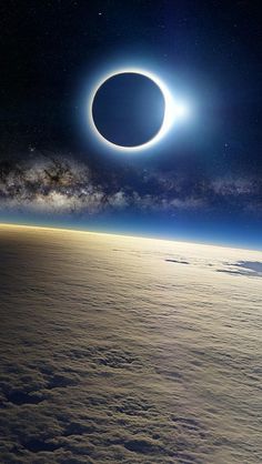 an eclipse is seen over the earth from space