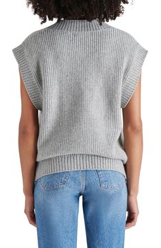 Combine sweater season with a summery day in a softly ribbed vest knit in a slouchy, relaxed fit. 26" length (size Medium) Front button closure V-neck 100% polyester Machine wash, dry flat Imported Fall Ribbed Vest For Layering, Spring Sweater With Ribbed Neckline, Ribbed Vest For Fall, Spring Everyday Sweater With Ribbed Neckline, Everyday Spring Sweater With Ribbed Neckline, Spring Knit Top With Ribbed Neckline, Casual Sweater Vest For Everyday Spring Wear, Spring Ribbed V-neck Vest, Spring Cotton Ribbed Sweater Vest