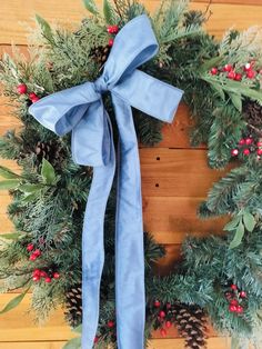 Elevate your holiday decor with this French blue coquette bow, featuring a floppy, trendy design perfect for Christmas wreaths or tree toppers. The soft dusty blue hue and long streamers add an elegant and whimsical touch to your festive decorations. What is so lovely about this ribbon is that the fabric is a heavier weight than many other ribbons, it has a lovely rich sheen, and the fabric has been manufactured to appear similar to dupioni silk, with the signature look. For indoor use or shelte French Blue Christmas, Bow Christmas Tree Topper, Trendy Wreaths, Blue Coquette, Bow Coquette, Tree Topper Bow, Dupioni Silk, Corrugated Box