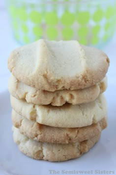 a stack of cookies sitting on top of a white plate