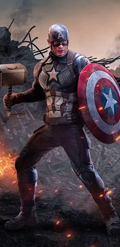 captain america the first avengers movie character holding an iron man shield in front of fire