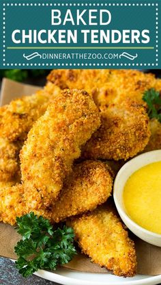 baked chicken tenders on a plate with dipping sauce