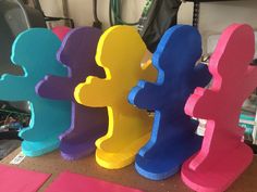 colorful wooden letters sitting on top of a table