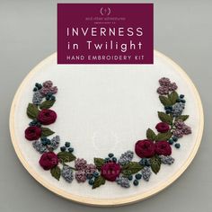 an embroidery kit with flowers on it and the words, inveness in twilight