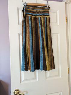 This beautiful skirt is the perfect addition for your spring/summer outfits. Pair it with a cute t-shirt or tank top and you're ready to go anywhere.. Casual Long Skirt For Beach Season, Casual Lined Maxi Skirt For Beach Season, Hippie Cotton Skirt For Beach, Bohemian Multicolor Skirt For Day Out, Fitted Multicolor Casual Maxi Skirt, Fitted Casual Multicolor Maxi Skirt, Casual Fitted Multicolor Maxi Skirt, Multicolor Summer Maxi Skirt, Multicolor Maxi Skirt For Day Out