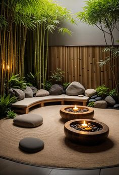 an outdoor area with bamboo trees, rocks and candles