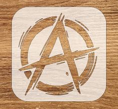 an apple logo is shown on a wooden surface