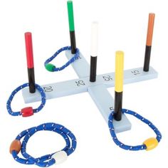 an image of a game set that is made out of rope and plastic tube rings