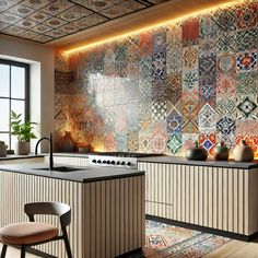 a kitchen with an island and tiled backsplash