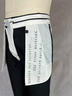 "Expose the Interior Unisex Dress Pants - Interior Details are Featured in These Expertly Tailored Trousers  Traditional Men's Dress Pants Upcycled to be Worn With the Interior Seen Unisex Men's Size 33 x 33 (Not Hemmed) Exposed Pockets, Waistband and Bound Seams Reversed Seams Hand Stamped Poem: \"Expose the Interior, The Inner Workings, The Private Parts Lightweight Wool Blend Material White Canvas Details On Trend High End Fashion" Fitted Cotton Pants With Hidden Pockets, Fitted Cotton Bottoms With Hidden Pockets, Menswear Details, Pink Denim Jacket, Men's Dress Pants, Trousers Details, Classic Pants, Unisex Dress, Mens Dress Pants