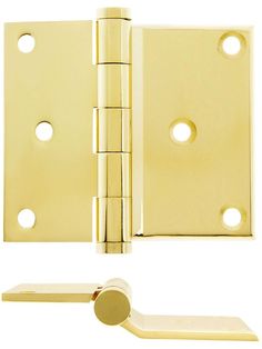 brass plated door hinges with round holes on the front and back sides