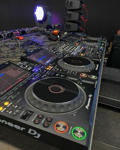 a dj's turntable with several controls on it