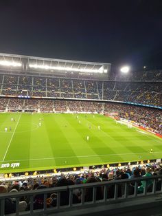 an empty soccer stadium filled with people