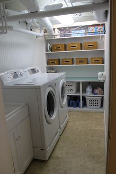 a washer and dryer in a small room