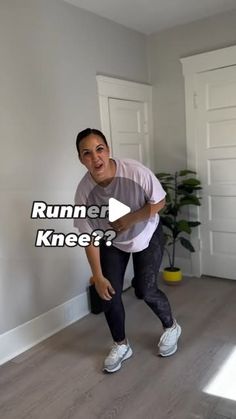 a man standing in front of a white wall with the words runner knee? on it