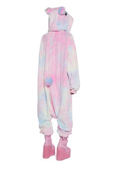 Be your favorite cuddly toy with this onesie that has a plush faux fur construction, an all over ombre rainbow pattern, an attached hoodie with embroidered animal face details, fuzzy ears and tail, side pockets, ribbed cuffs, and a front zipper closure. Animations Character, Fur Onesie, Womans Halloween Costume, Unicorn Onesie Pajamas, Face Details, Ears And Tail, Onesie Pajamas, Costume Store, Pride Outfit