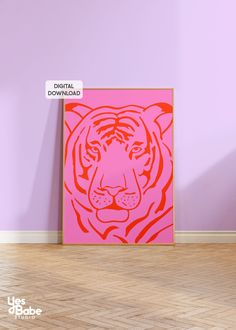 a pink and orange tiger print on a wall in an empty room with hardwood floors