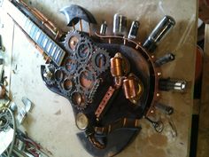 an electric guitar made out of metal parts