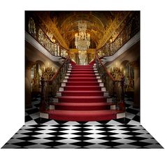 a red carpeted staircase leading up to a chandelier