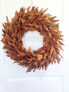 a close up of a wreath on a door