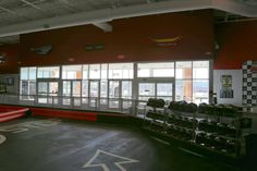 the inside of a gym with treads and exercise equipment