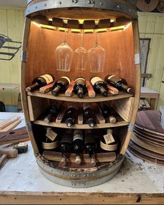 a wine barrel filled with lots of bottles