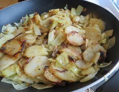 the food is being cooked in the pan on the stove top, ready to be eaten