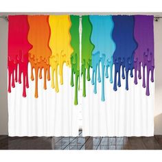 rainbow paint dripping down the side of a curtain