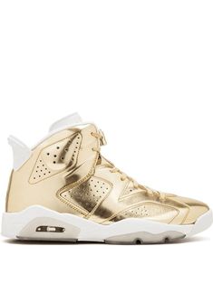 Supplied by a premier sneaker marketplace dealing with unworn, already sold out, in demand rarities. Each product is rigorously inspected by experienced experts guaranteeing authenticity. You're always a winner when you have a pair of Jordans. Crafted from white and gold-tone leather and rubber, these Air Jordan 6 Retro pinnacle from Jordan are sure to make you feel like you've won a first-place medal. Your own trophy. Featuring a round toe, a high ankle, a flat sole, a metallic sheen, a lace fa Jordan 5 Metallic White, Jordan Metallic Silver, Luxury Gold High-top Sneakers For Men, Jordan Gold, Wmns Air Jordan 6 Retro 'gold Hoops', Air Jordan 6 Retro, Jordan 6 Retro, Jordan Air, Air Jordan Sneakers