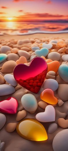 a red heart surrounded by many different colored rocks