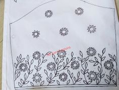 a piece of paper that has been embroidered onto it with flowers and leaves on it