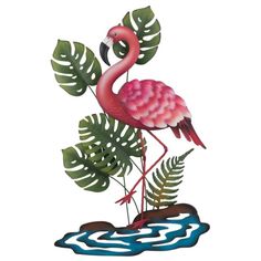 a pink flamingo standing on top of a lush green plant