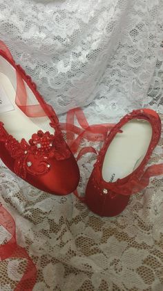 True Red Ballerina slipper style flat shoes, embellished with red lace and Crystals I meticulously designed these beautiful Red shoes fit for a real princess on her wedding day A Holiday Wedding Or, Valentines Wedding, or any one who loves Red I hand dyed and hand embellished them, these are not found in stores I used beautiful first class elements: Bridal lace trim, organza red ribbon to match the shoes US Adult Sizes: 5, 5.5, 6, 6.5, 7, 7.5, 8, 8.5, 9, 9.5, 10, *11 & *12 and W Wide width f Red Lace Shoes, Red Round Toe Ballet Flats For Evening, Red Round Toe Flats For Wedding, Red Ballerina, Red Ballerinas, Red Shoes Flats, Valentines Wedding, Wedding Slippers, Red Slippers