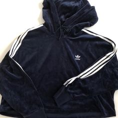 Velour Cropped Hoodie (Product Color: Collegiate Navy/White) Oversized Navy/Royal Blue Velvet Cropped Hoodie Embroidered Adidas Logo On The Chest 3 Stripes On Both Sleeves With Ribbed Cuffs Drawcord-Adjustable Hood No Pockets Measurements: Chest (60"), Length (19.5"), Sleeve From The Collar (~28") Open To Offers, No Trades Please. Single Clothes, Adidas Sweatshirt Women, White Hooded Sweatshirt, Hoodie Adidas, Adidas Cropped Hoodie, Adidas Pullover, Vintage Hoodie, Adidas Sweatshirt, Adidas Hoodie