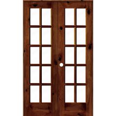 the doors are made from wood and have glass panels