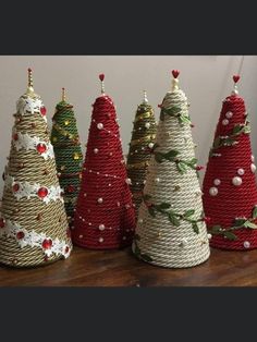 several small christmas trees made out of rope