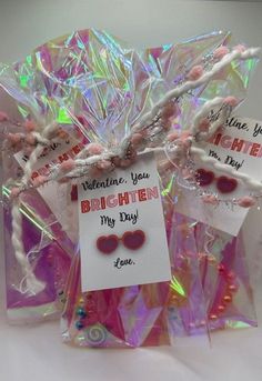 valentine's day candy bags with tags attached to them